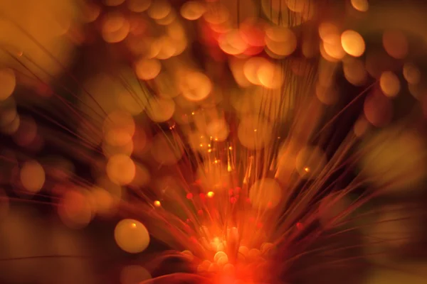 Light, blurred sparkles as background — Stock Photo, Image