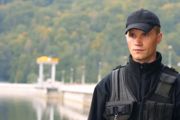 Security guard in uniform, portrait — Stock Photo, Image