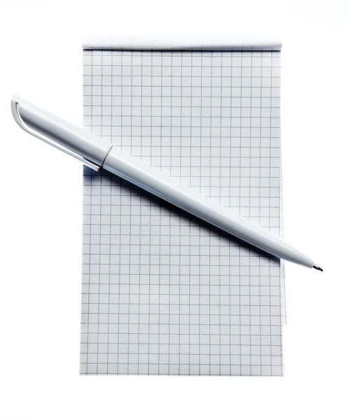 Square stripped notepad with pen — Stock Photo, Image