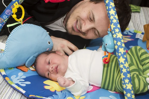 Newborn baby and father — Stock Photo, Image