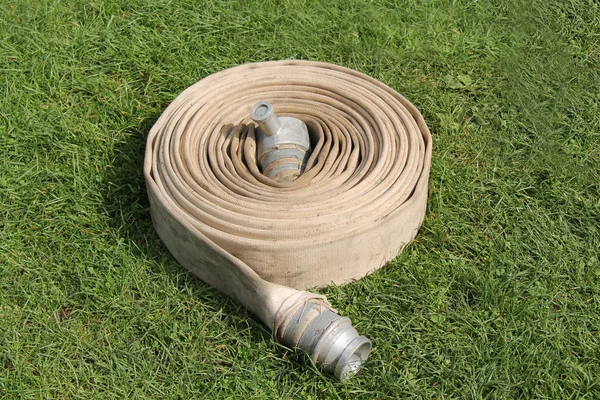 Coiled Fire Hose. — Stock Photo, Image