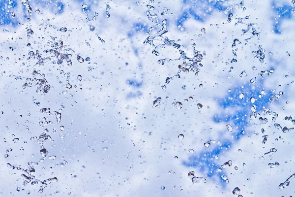 Waterfall rain with blue sky — Stock Photo, Image