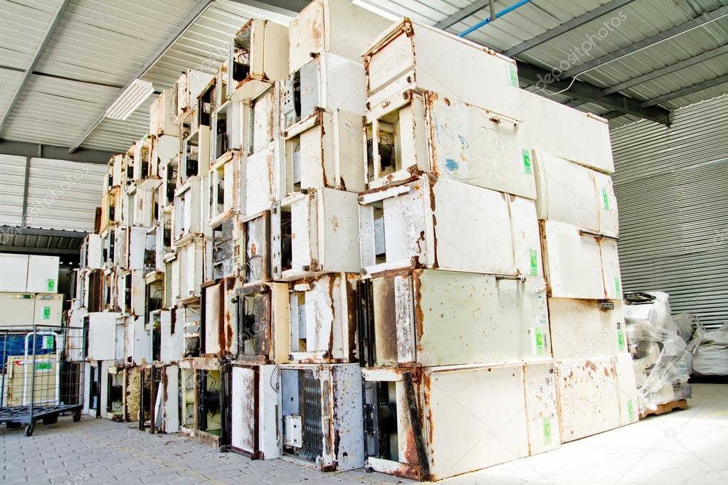 Reduce, reuse, recycle of refrigerators in a recycling plant.