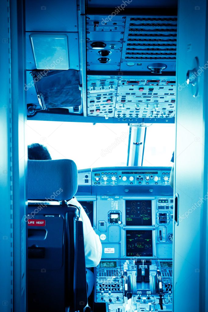 Commercial airplane interior cockpit color processed blue