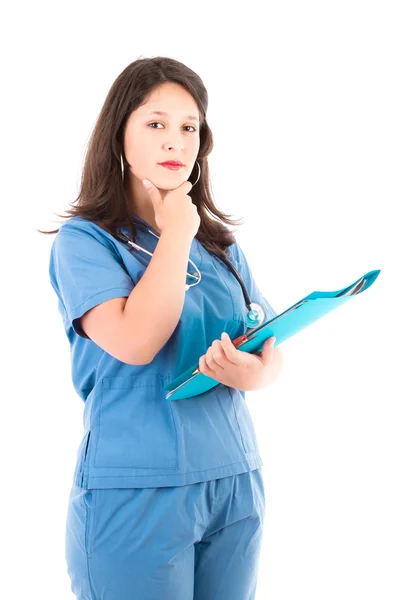 Female doctor on white carying patients history — Stock Photo, Image