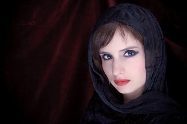Portrait of an attractive girl with a scarf hijab