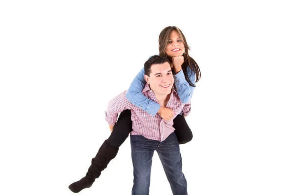 Feliz sorrindo casal piggyback juntos — Fotografia de Stock