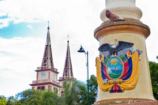 Streets of town in Ecuador, coat of arms — Zdjęcie stockowe