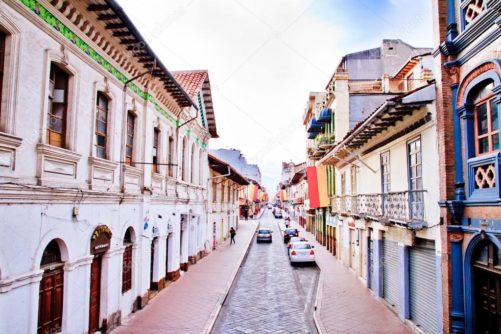 Streets of Cuenca Ecuador during the festivities with city flags