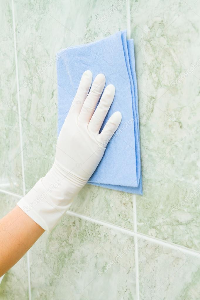 Female household, tile cleaning with gloves