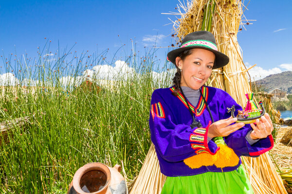 Woman in traditional clothes, lake Titicaca