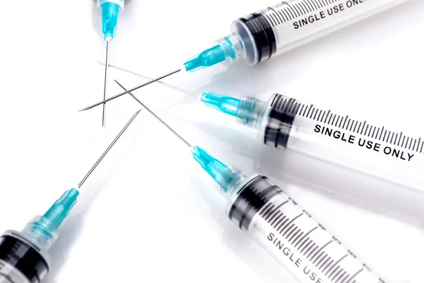 Medical syringes on a white background — Stock Photo, Image