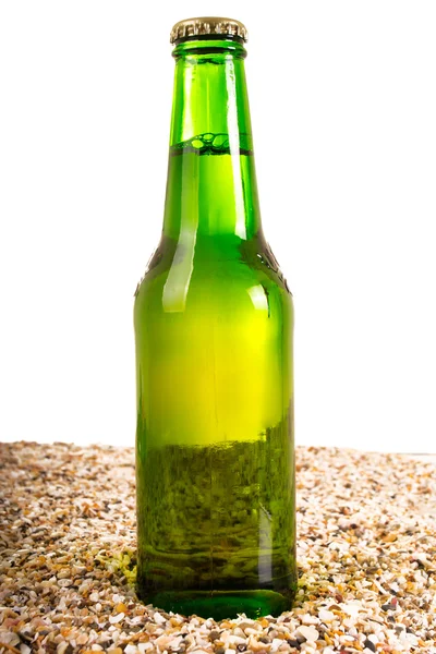 Beer and beach sand, studio shot — Stock Photo, Image