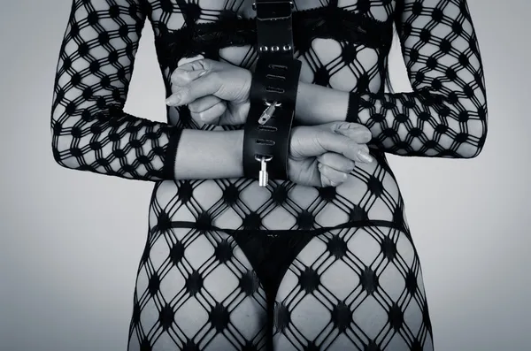 Woman with Leather handcuffs with chains — Stock Photo, Image