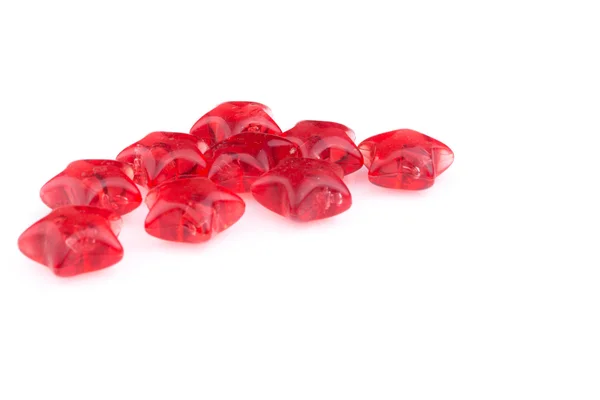 Red stars scattered on a white background — Stock Photo, Image