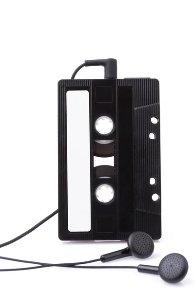 Cinta de cassette de música y auriculares — Foto de Stock