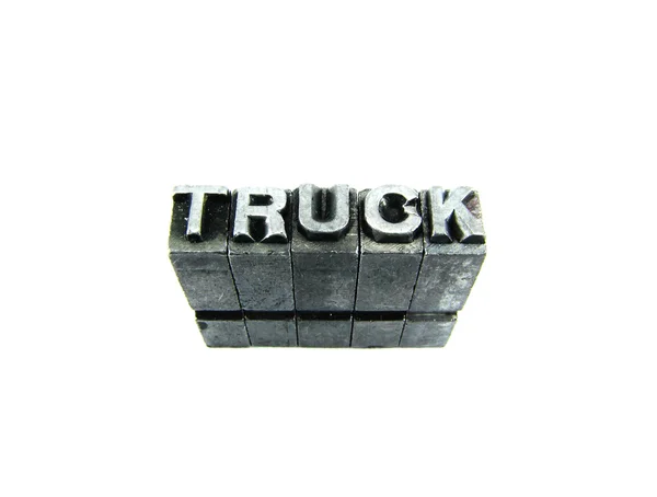 Tanda truk, huruf metal antik terisolasi — Stok Foto