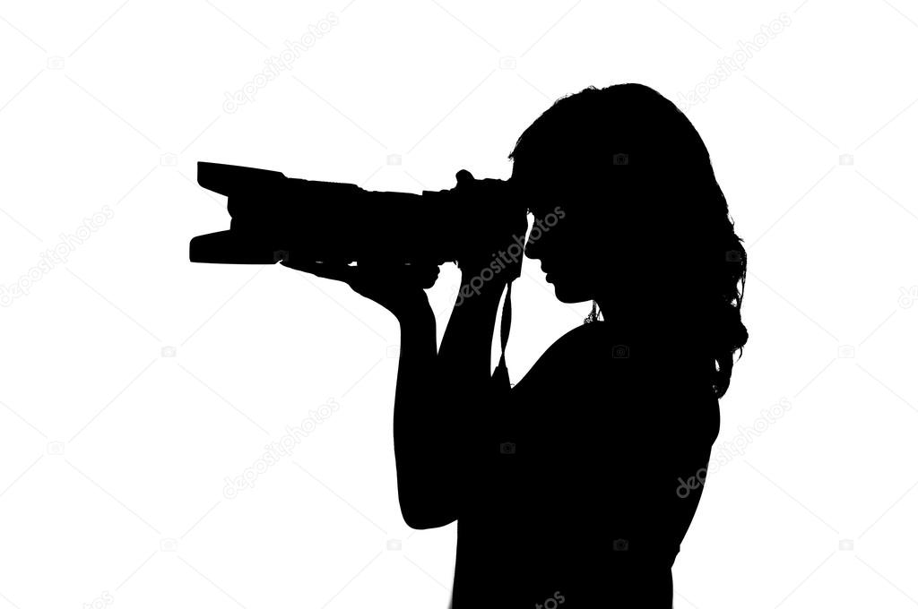 Silhouette of a girl with a camera