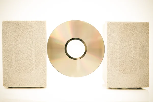 Compact Disk, Speakers color processed sepia — Stock Photo, Image