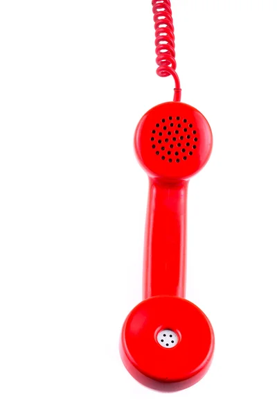 Récepteur téléphonique rouge sur fond blanc. — Photo