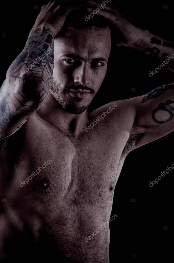 Handsome man with tattoos Stock Photos, Royalty Free Handsome man with  tattoos Images | Depositphotos