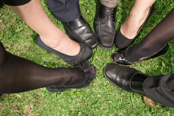 Gambe di affari in un cerchio — Foto Stock