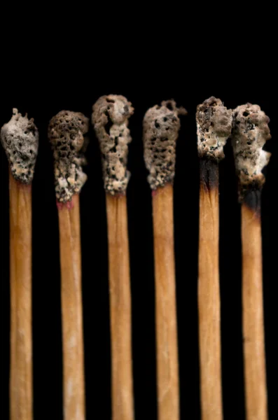 Burnt matches, close-up, black background — Stock Photo, Image