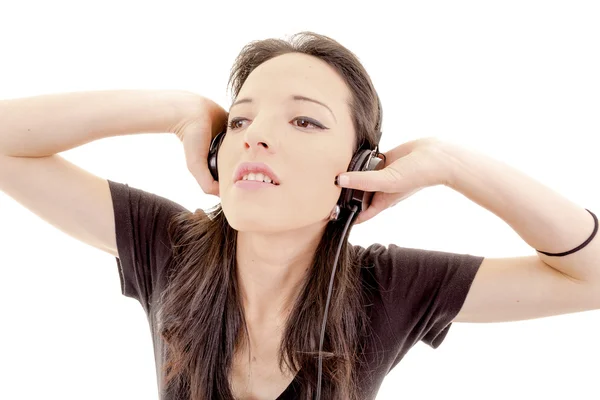 Relajada mujer escuchando música studio shot — Foto de Stock