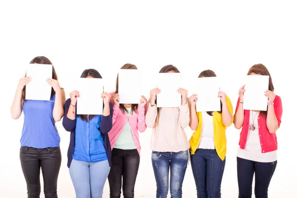 Mujeres escondiendo sus rostros detrás de señales en blanco — Foto de Stock