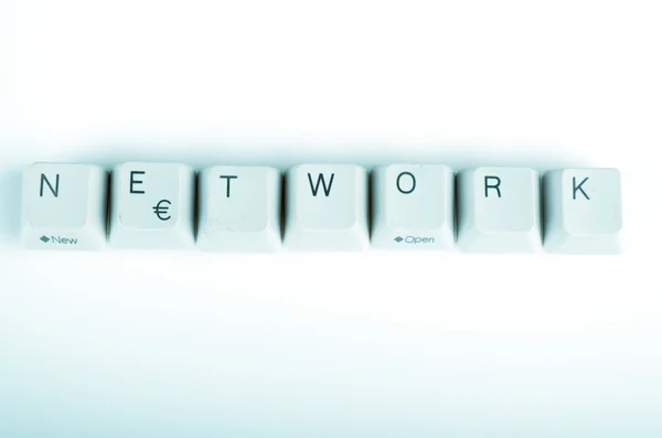 Netwerk woord geschreven met computer knoppen — Stockfoto