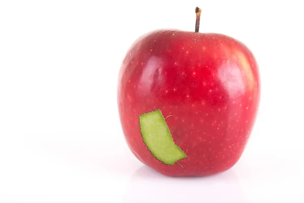 Manzana con parche verde aislado sobre blanco —  Fotos de Stock