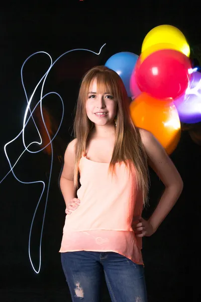 Picture of happy woman with balloons — Stock Photo, Image