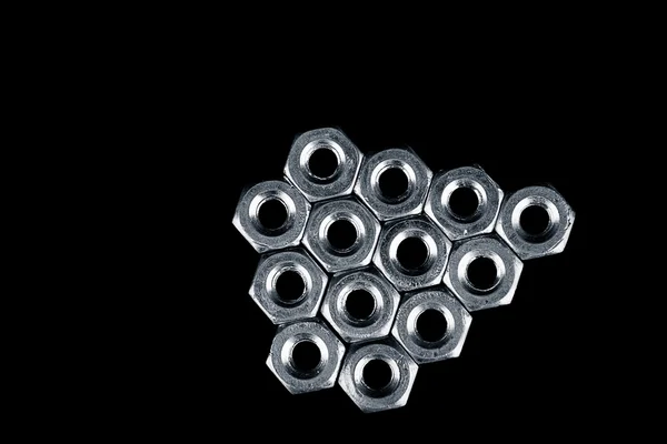 Set of bolts on black — Stock Photo, Image