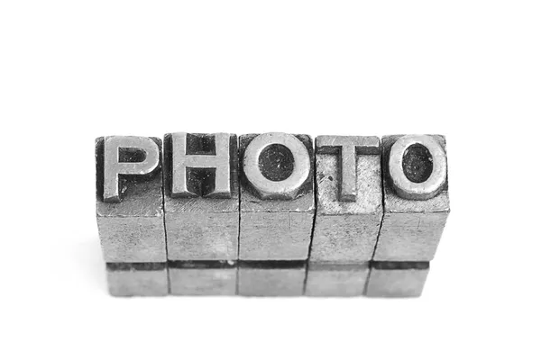Foto tecken, antika metall brev typ — Stockfoto