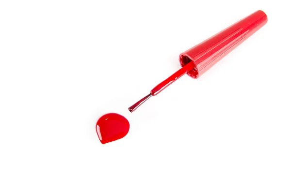 Vermelho esmalte prego sobre fundo branco — Fotografia de Stock