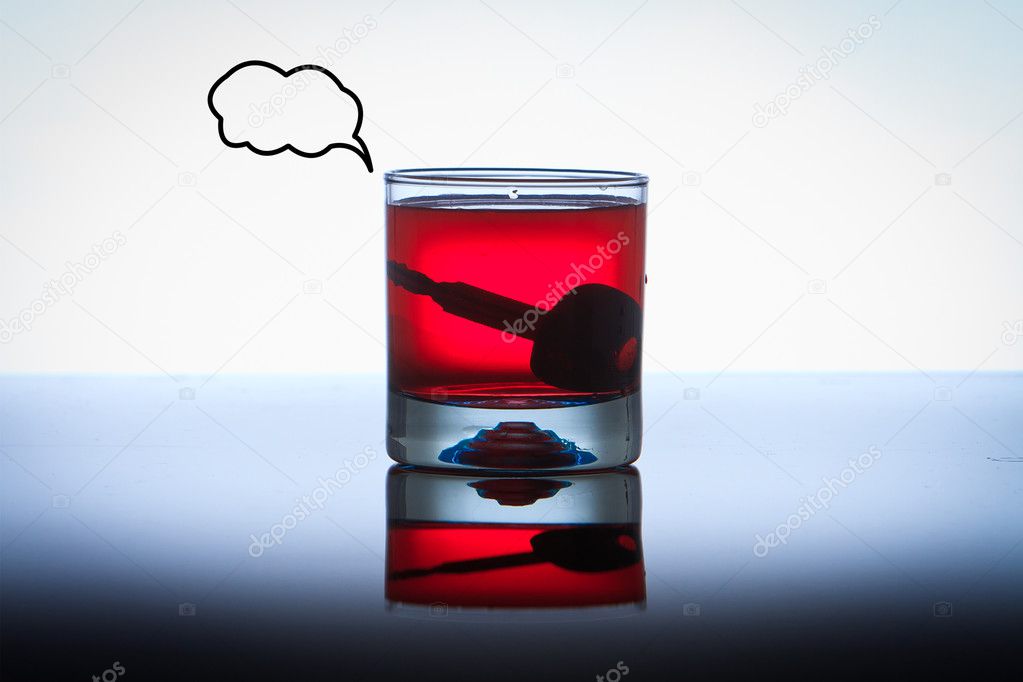 Alcoholic Drink with Car Keys concept drinking and driving