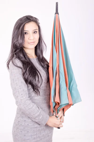 Sexy elegant young hispanic woman posing with umbrella — Stock Photo, Image