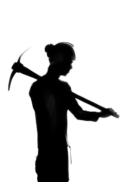 Silhouette of a Mine worker with a pick
