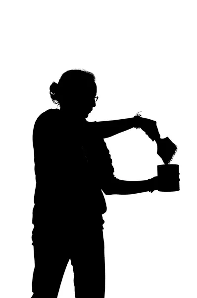 Silhouette of a Professional young painter woman. — Stock Photo, Image