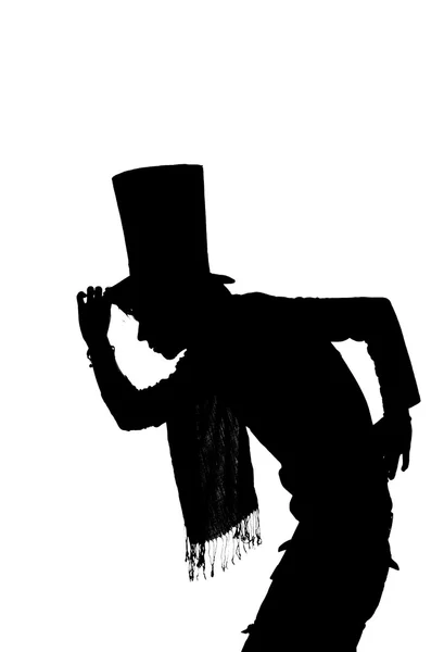 Silhueta de um homem bonito com chapéu saudando — Fotografia de Stock