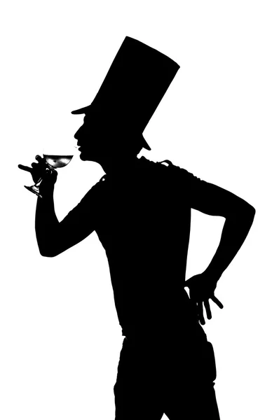 Silhueta de um homem com um copo de vinho tinto — Fotografia de Stock