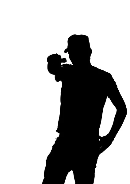 Silhouette of a young male pointing gun. — Stock Photo, Image