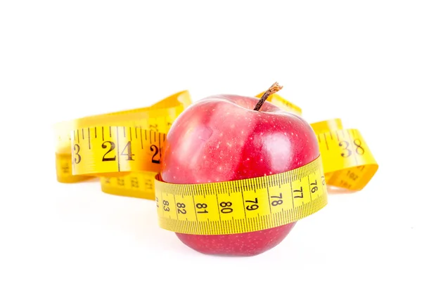 Manzana roja con medición aislada en blanco — Foto de Stock