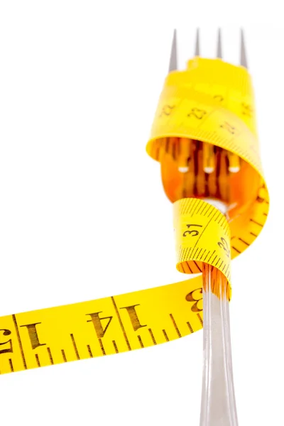 Fita métrica em um conceito de garfo — Fotografia de Stock