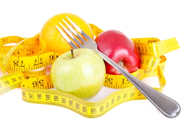 Diet concept. Fruits with measuring tape — Stock Photo, Image