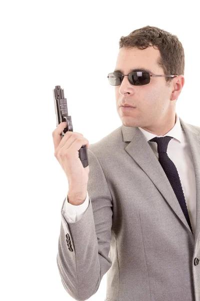 Бізнесмен з пістолетом ізольований на білому — стокове фото