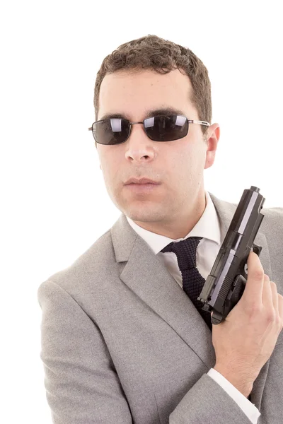 Businessman with gun isolated on white — Stock Photo, Image