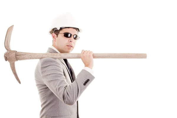 Man in suit displaying pick-axe — Stock Photo, Image