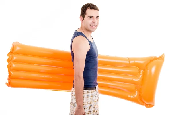 Op vakantie glimlachend jonge man klaar voor het strand, geïsoleerd — Stockfoto