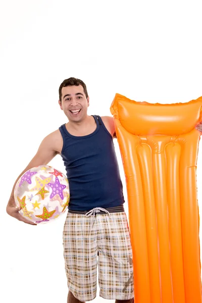 Young man ready for the beach, with ball isolated — Stock Photo, Image